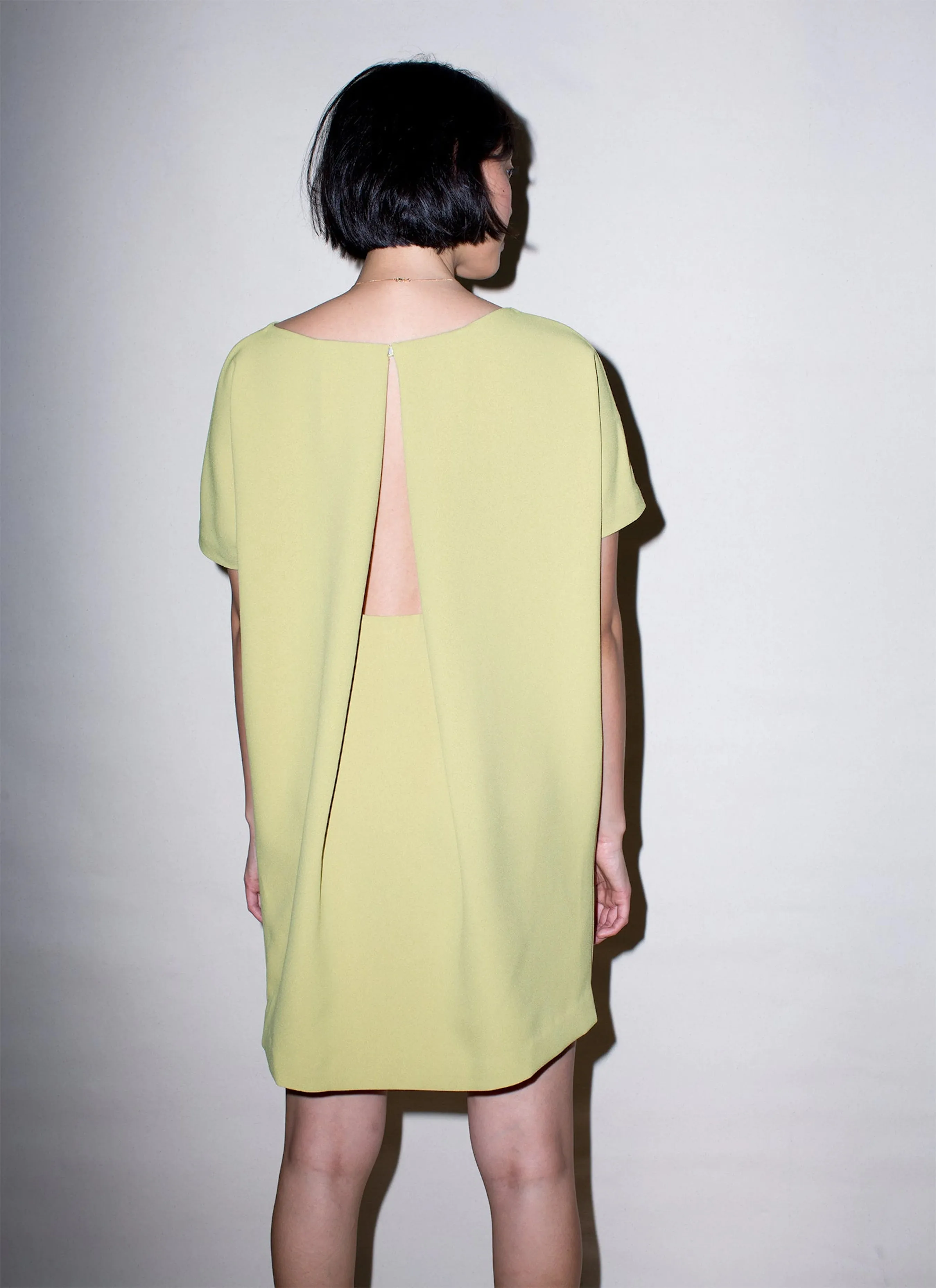 angle open back dress