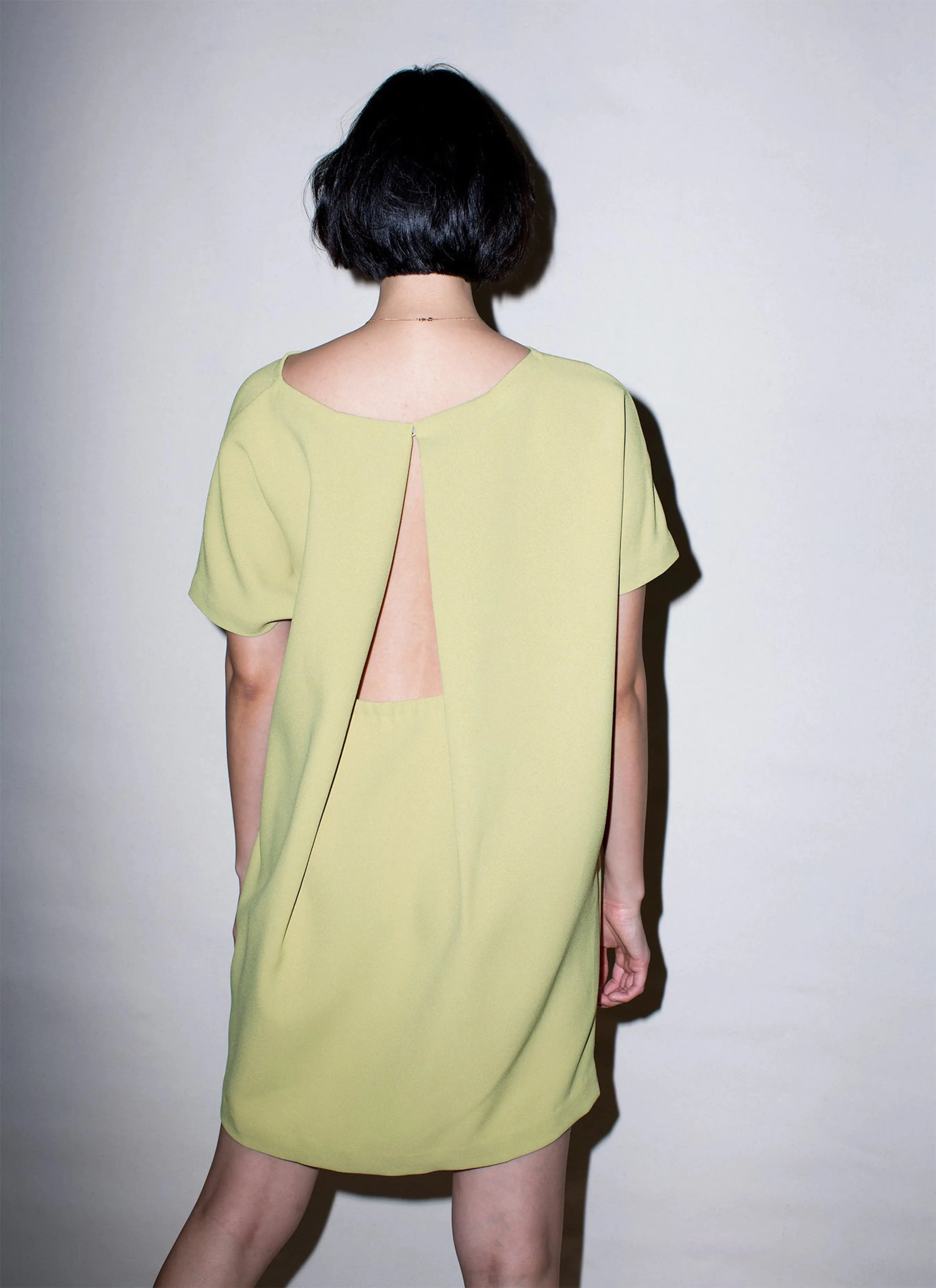 angle open back dress
