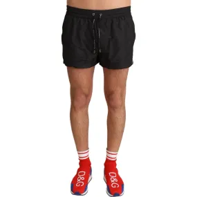 Dolce & Gabbana Elegant Black KING Motive Swim Trunks